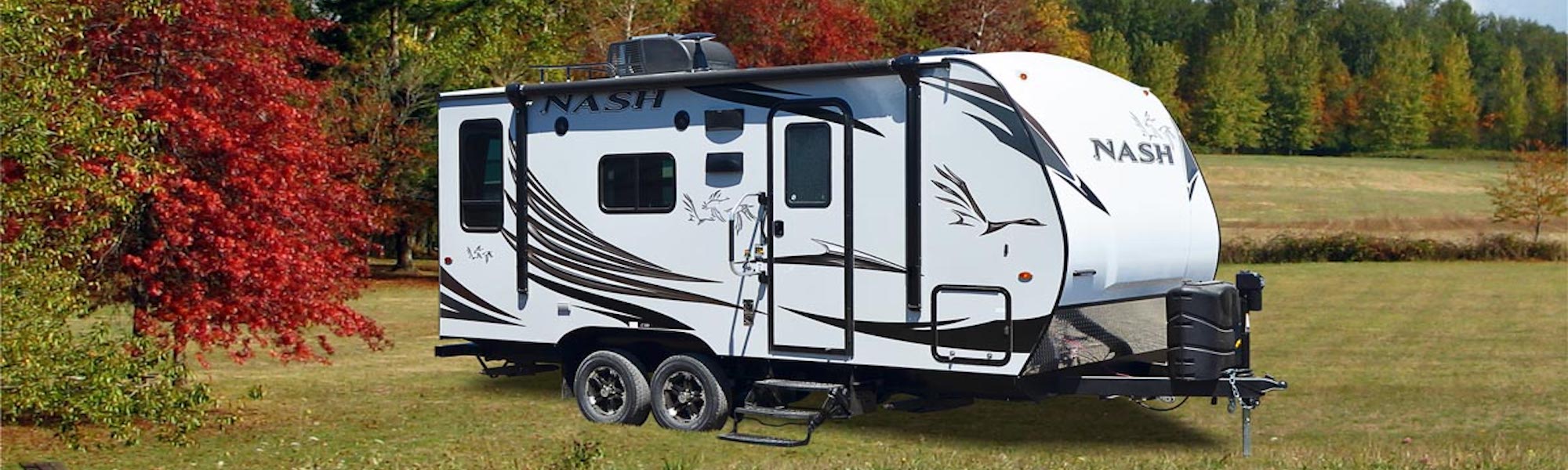 <a href=<img src="images/upload/October_2021/Northwood-Nash-Okanagan-BC.jpeg">alt="A 2021 grey, white, and black Northwood Nash travel trailer parked in a grassy field with colourful fall trees in the background."/></a>