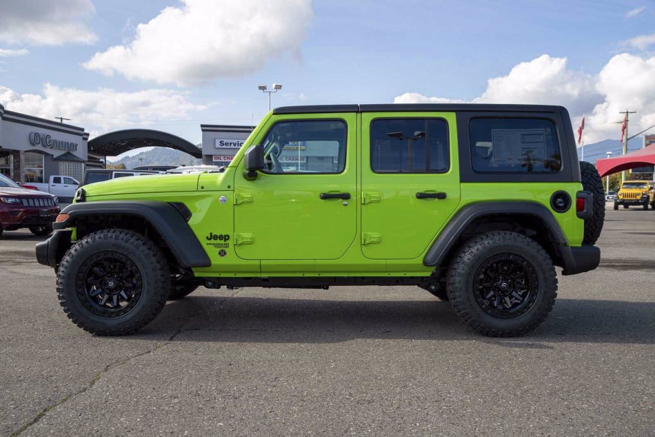 A Green 2021 Jeep Wrangler Unlimited Sport S
