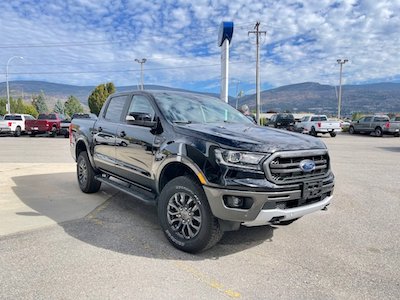 <a href="https://clients.webstager.com/skahaford.com/inventory/#/?&orderBy=5&asc=1&t=0&filter=[New%2CFORD%2CRanger%2C2021%2C%2C%2C%2C%2C%2C%2C%2C%2C%2C%2C%2C%2C%2C%2C%2C%2C%2C]"><img src="images/upload/2021_September/Easy_Deal/photo-of-2021-ford-ranger-lariat-exterior-features-penticton-bc.jpeg"alt="A black 2021 Ranger Lariat parked on Skaha Ford's dealership lot in Penticton BC"/></a>