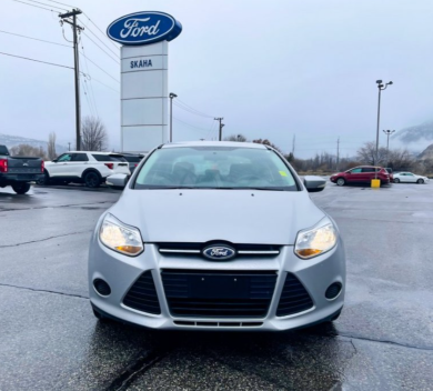 <a href="https://clients.webstager.com/skahaford.com/inventory/details/900/used-2013-ford-focus-se-1FADP3F25DL140014"><img src="/images/upload/2021_September/skaha_ford_focus_2013.png"alt="2013 Ford Focus sedan in front of a Skaha Ford sign"/></a>