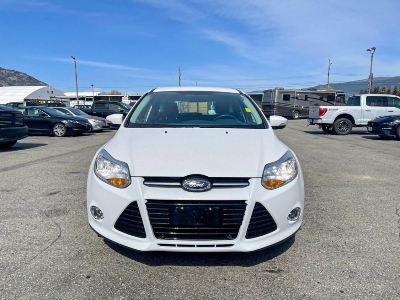<a href="https://clients.webstager.com/skahaford.com/inventory/#/?&orderBy=6&asc=1&t=0&filter=[Used%2C%2C%2C%2C%2C0%2C%2C%2C15000%2C%2C%2C%2C%2C%2C%2C%2C%2C%2C%2C%2C%2C]"><img src="/images/upload/April_2021/2012_ford_focus_sel.jpg"alt="Front view of 2012 Ford Focus SEL hatchback in a parking lot"/></a>