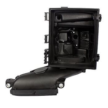 Image of a Ford Fusion air filter housing against a white background.