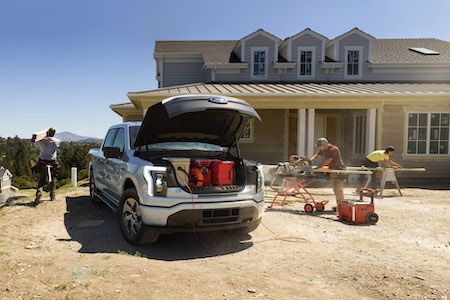 <a href="https://clients.webstager.com/skahaford.com/2022-ford-f150-lightning-truck-in-canada/%C2%A0"><img src="images/upload/June_2021/commercial_news/8_16x9.jpg"alt="A grey 2022 Ford F-150 Lightning at a job site with the front trunk powering tools and holding coolers."/></a>