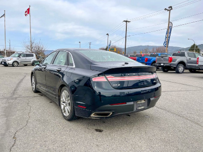 <a href="/images/upload/May_2021/lncoln_MKZ_back_view.jpg"><img src="https://clients.webstager.com/skahaford.com/under-15k/"alt="back view of 2014 Mazda mkz"/></a>