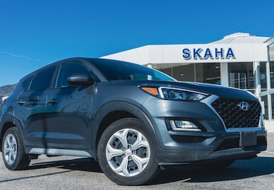 <a href="https://clients.webstager.com/skahaford.com/inventory/details/2077/used-2019-hyundai-tucson-se-KM8J2CA48KU872256"><img src="images/upload/May_2022/BF-3-2019-hyundai-tucson-under-30k-penticton-bc.jpeg"alt="A grey 2019 Hyundai Tucson SE AWD on Skaha Ford's used vehicle lot in Penticton BC"/></a>