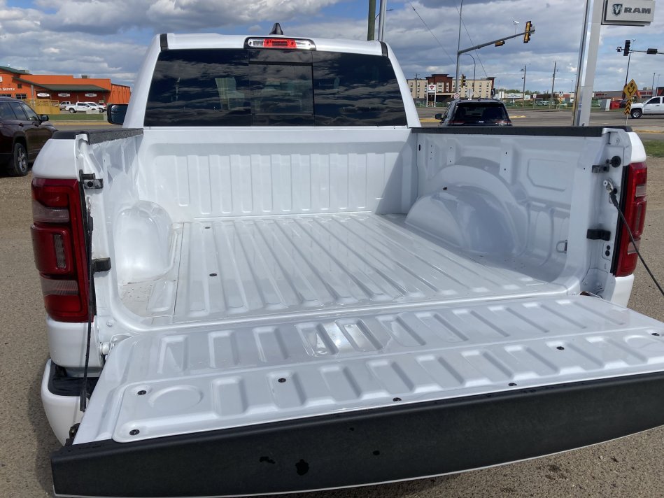 RAM 1500 Laramie 1C6SRFJT7NN182579 77549